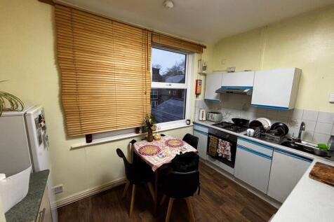 Bright, functional kitchen with integrated appl...
