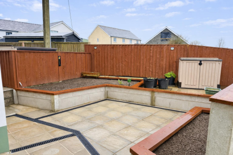 Backyard garden with tiered beds.png