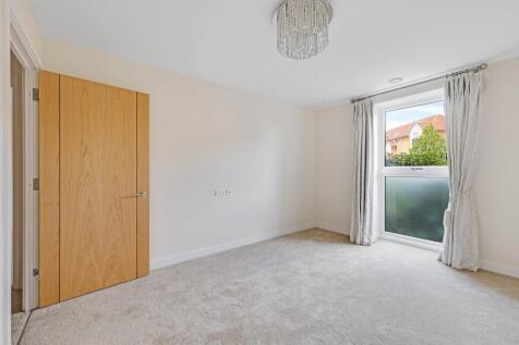 a room with a door and a window