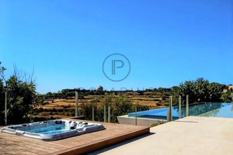 The image shows a serene outdoor setting featuring