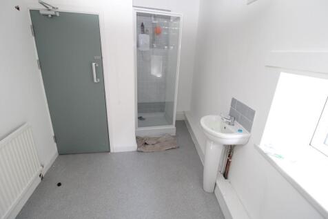 Bright and tidy modern shower room with window...
