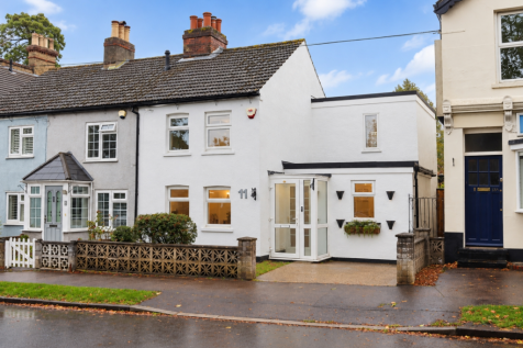 White Terraced House with Autumn Street View