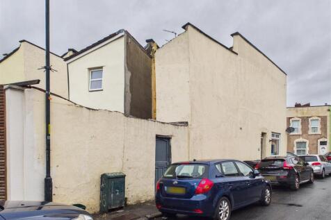 House arranged as two flats for auction, Totterdow
