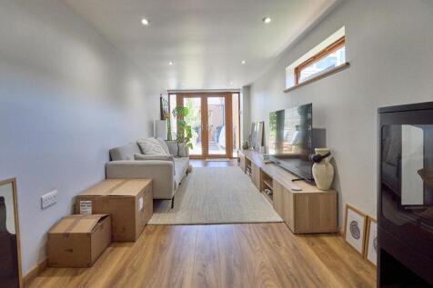 Extended through lounge/dining room to rear