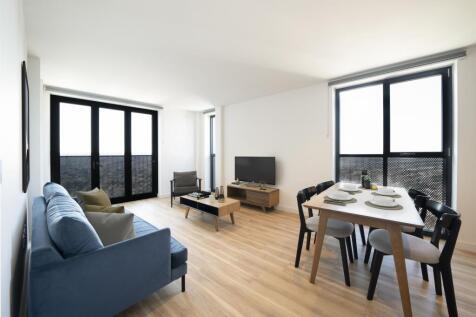 Experience the elegance of a contemporary living room designed for relaxation and style.