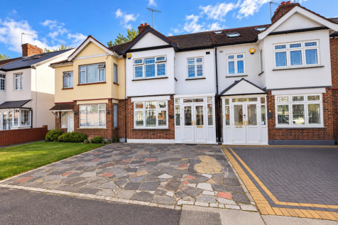 Sunny Terraced Homes and Driveways.png
