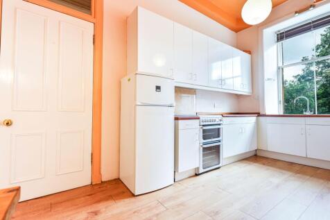 Spacious view of cabinetry