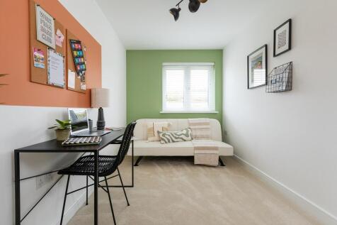 The bright and airy third bedroom could be used as a study, art studio or nursery