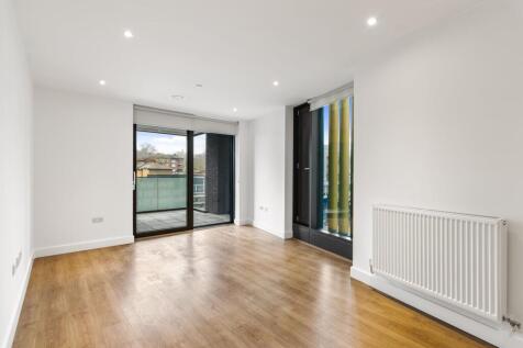 Step into a bright and welcoming living space designed for urban comfort and relaxation.