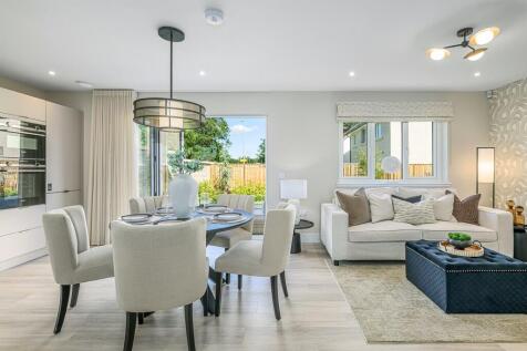 4 bedroom plus study showhome | open plan high spec kitchen and dining area with bi-fold doors to th
