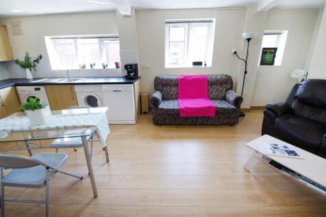 Bright open-plan living space with dining area...