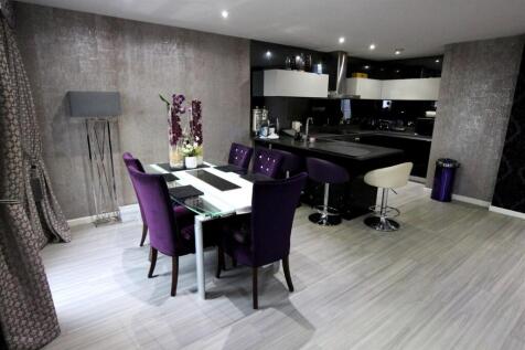 Stylish open-plan lounge and dining area...