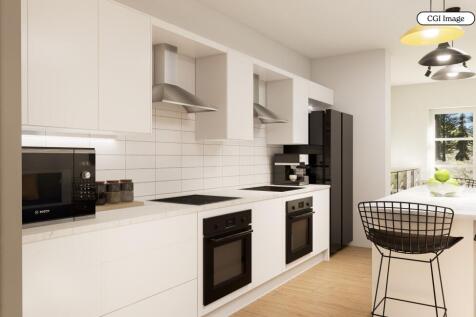 Bright modern fitted kitchen with dining spot...