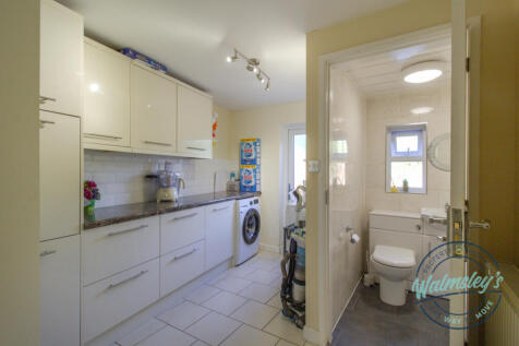 Utility and cloakroom with garage situated off