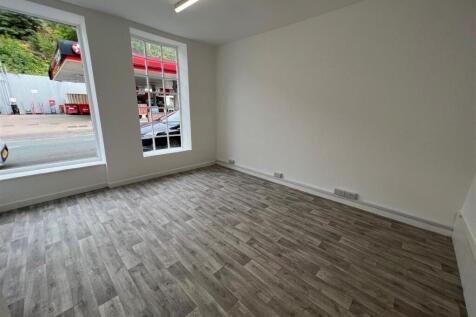 Bright workspace with modern wood-style floorin...