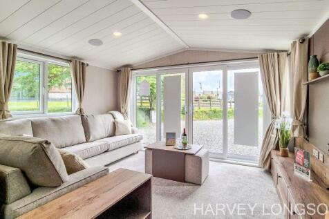 Spacious lounge with French doors in Swift Faygate