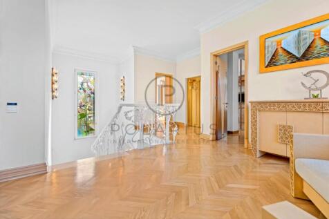 Bright interior with hardwood flooring, decorative