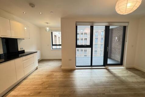 This spacious 1-bedroom flat offers modern living with furnished or unfurnished options. It includes a well-equipped kitchen (dishwasher, microwave, washer/dryer) and a large private balcony overlooki