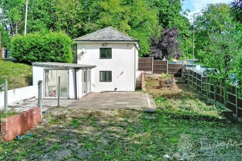 View to side of house and garden