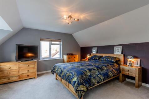 The Cottage, Over Lane Master Bed.jpg