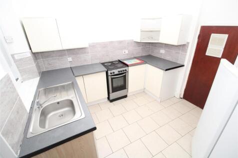 Bright kitchen with ample workspace and storage...