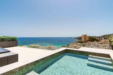 Sea view duplex penthouse with a huge roof terrace and private pool in Cala Mayor