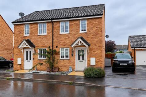 Rainy Suburban Semi-Detached Homes.jpg