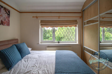 Bedroom three overlooking gardens