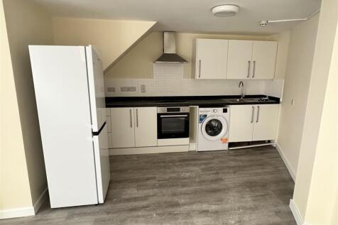 Modern kitchen with integrated appliances...