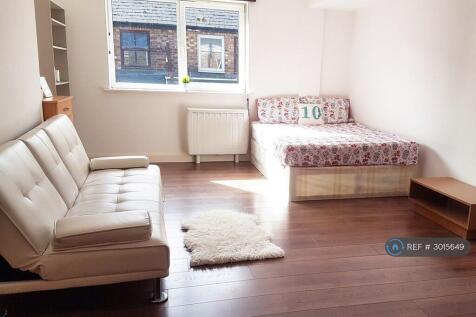 Bright Furnished Bedroom And Living Area