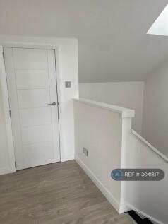 Upper Hallway Of Apartment