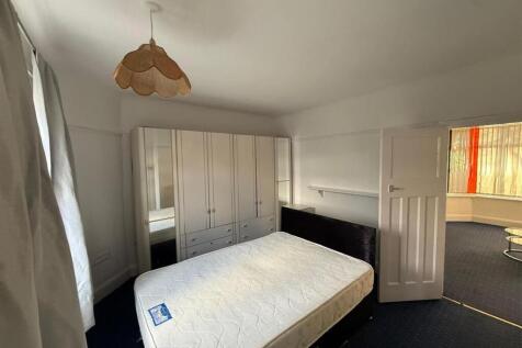 Bright double bedroom with ample storage space...