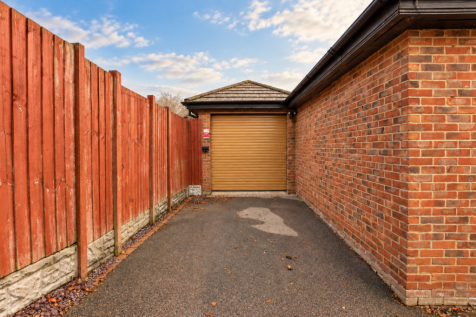 Driveway to Brick Garage