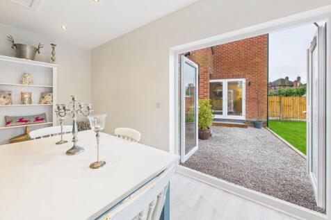 Insulated Outbuilding onto Garden