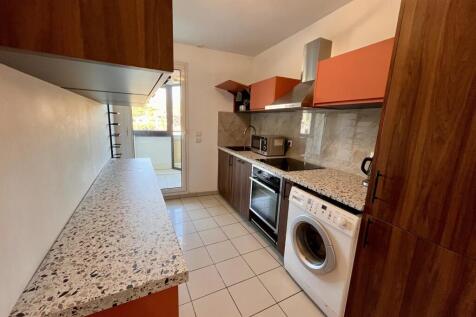 Modern kitchen with ample storage and stainless st