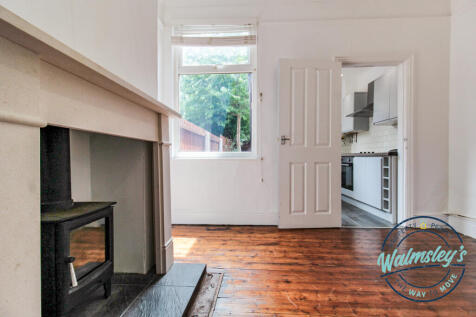 Rear living room with log burner