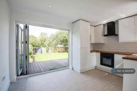 Kitchen Dining Room With Bifold Doors To Deck
