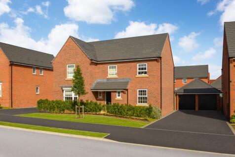 outside view of detached home with double garage and driveway