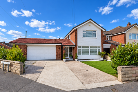 Sunny Suburban Home with WAVANA RISE Sign.png
