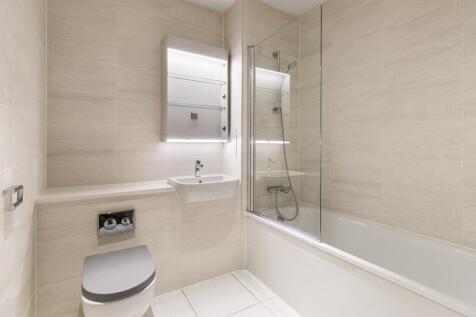 Experience luxury with this sleek and modern bathroom, perfect for relaxation and comfort.