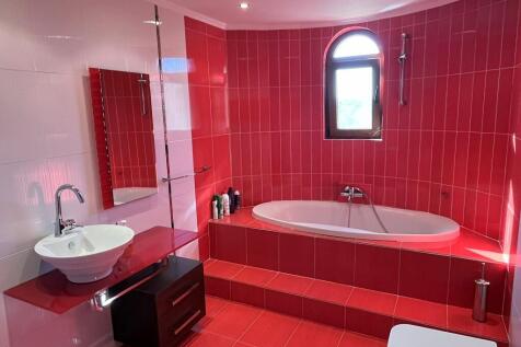 Red bathroom upstairs