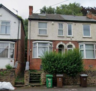 Charming exterior of a traditional semi-detache...
