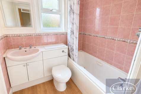 Bright Mauve-Tiled Bathroom Interior