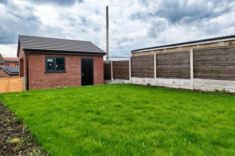 Rear Garden and Detached Garage 