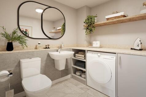 A handy downstairs toilet &amp; utility sits off the main entrance hall