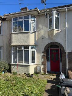 Charming terraced home with a bright bay window...