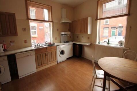 Bright, well-equipped kitchen with large window...