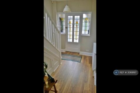Entrance Featuring Original Stained Glass