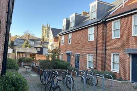 Modern brick townhouses with ample bike storage...
