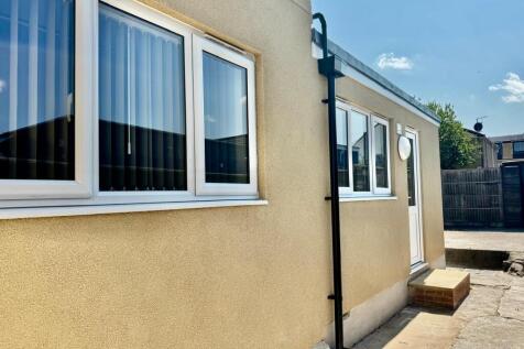 Bright and modern exterior with large windows...